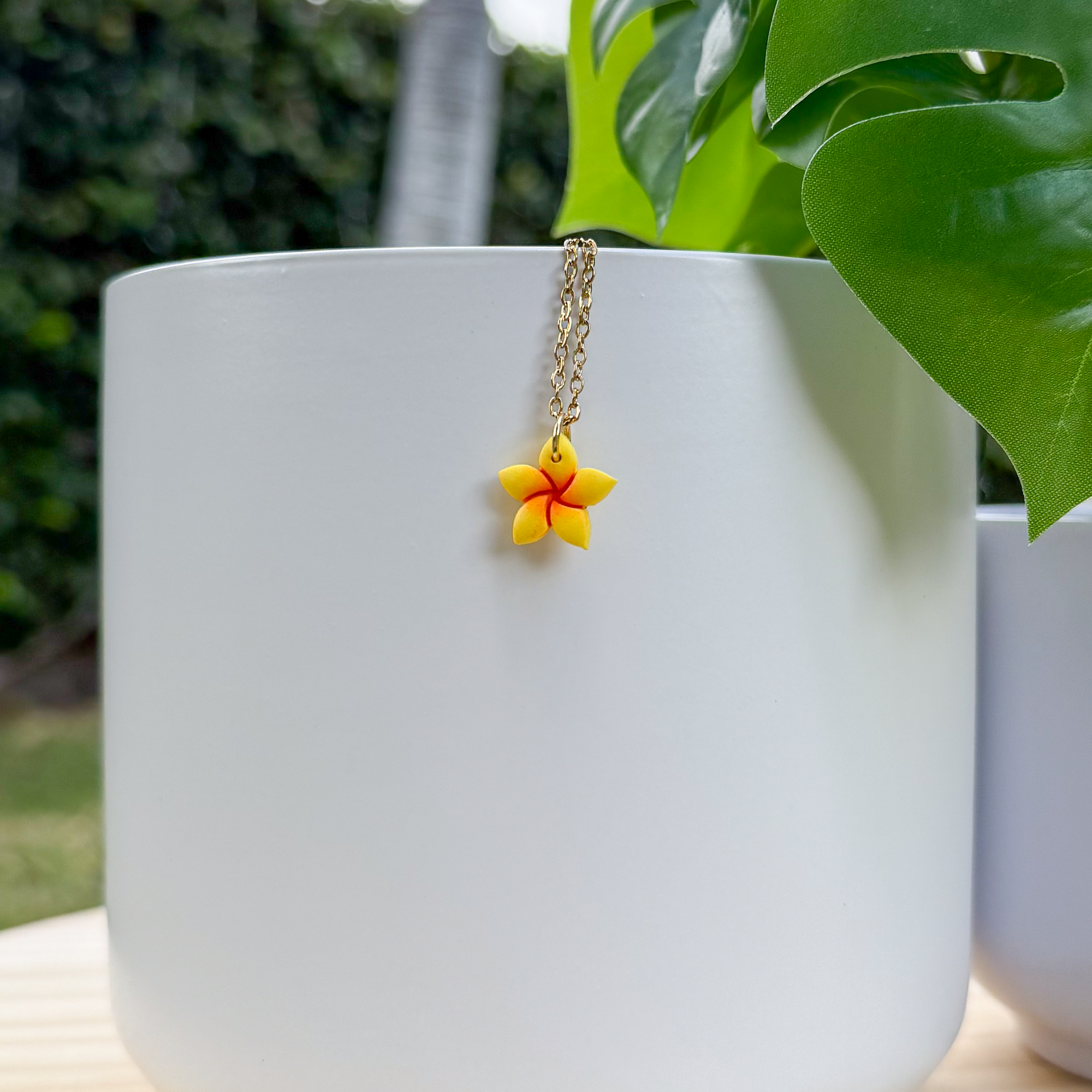 Plumeria charm necklace
