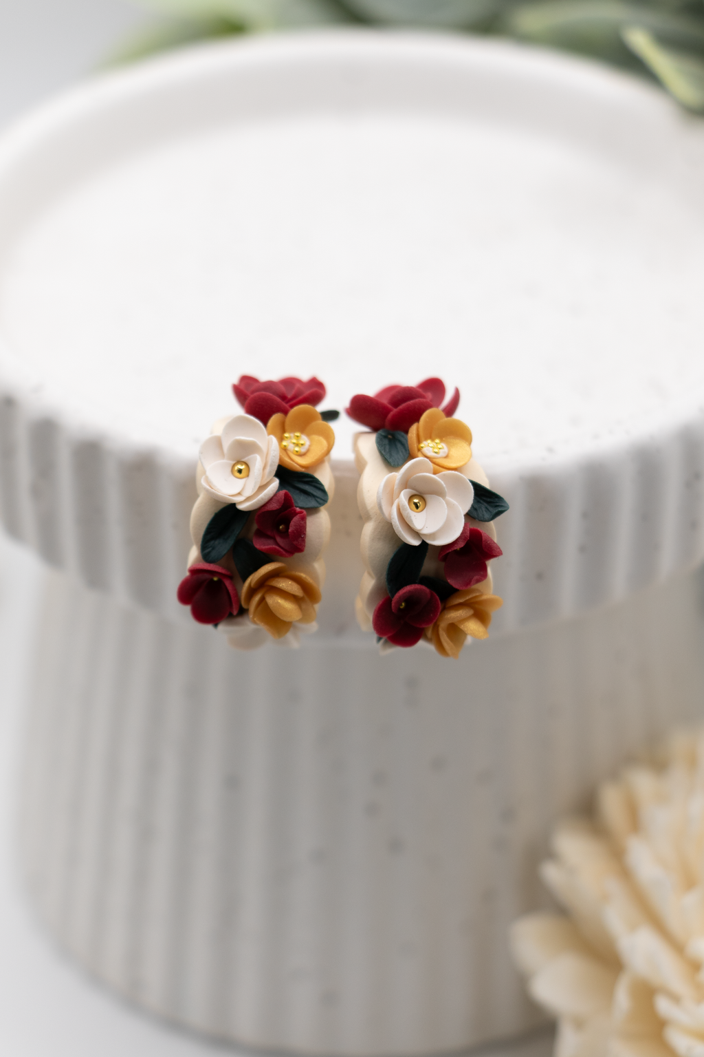 Flower huggie earrings