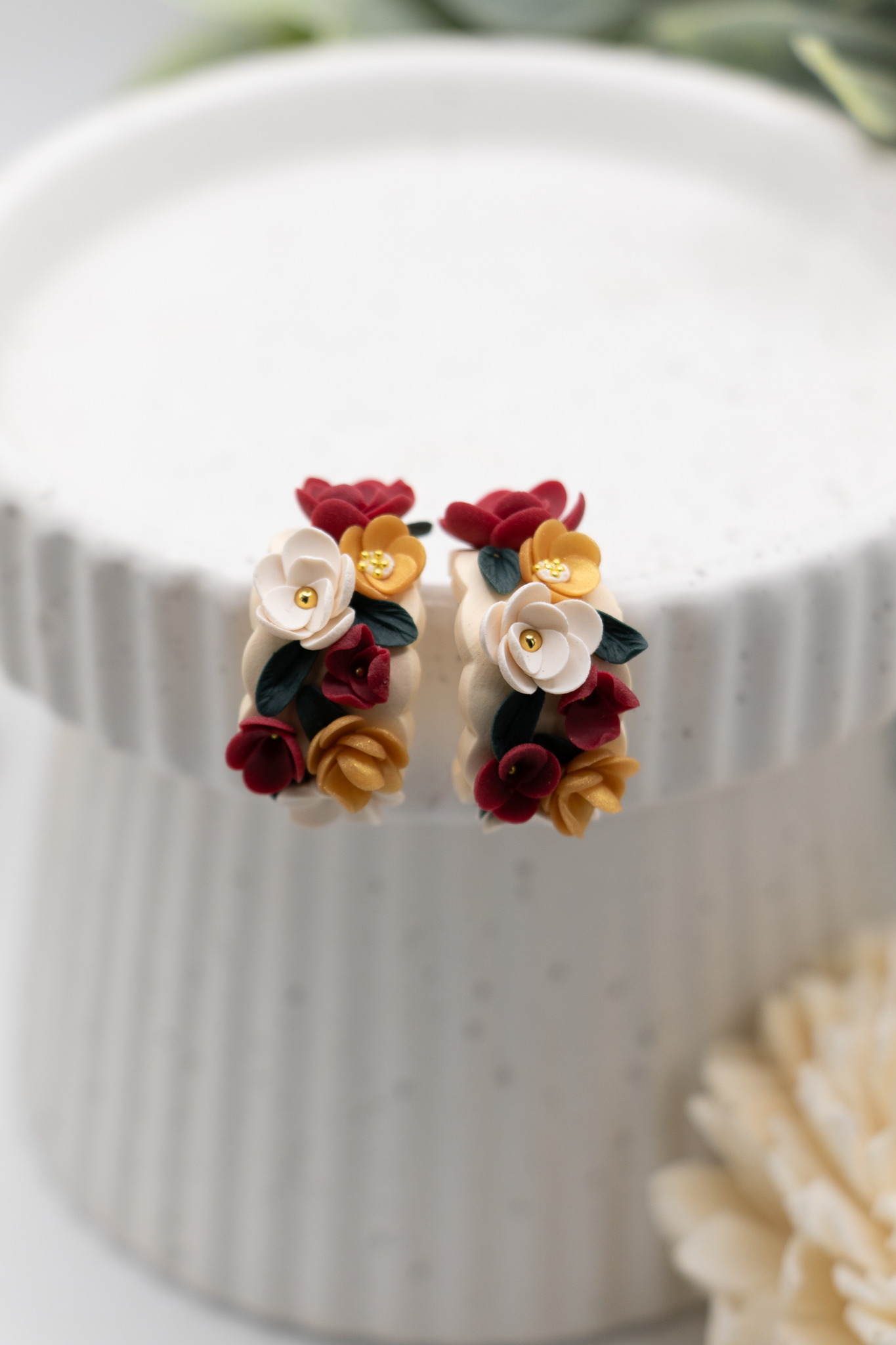 Flower huggie earrings