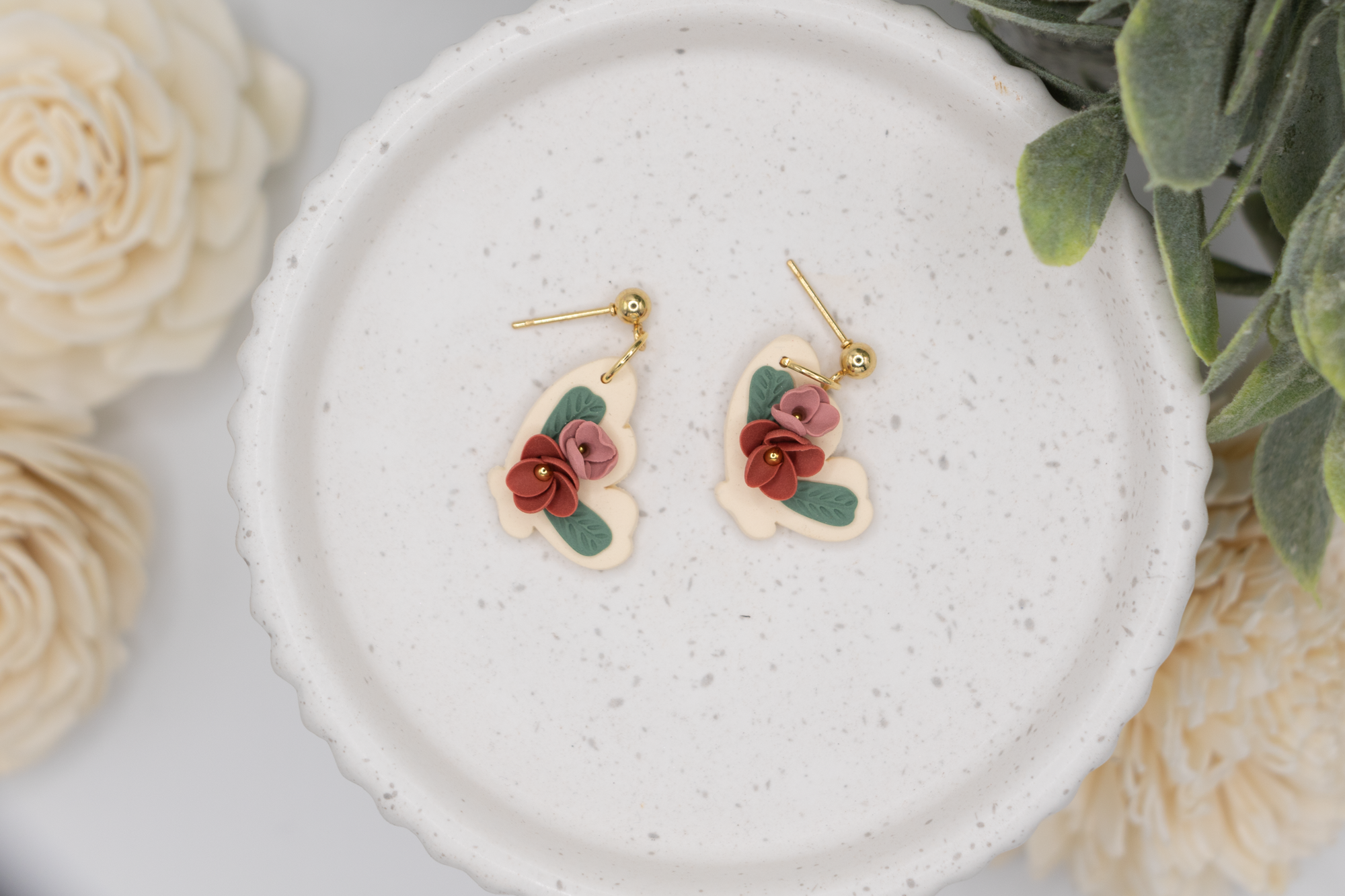 Floral butterfly wing dangle earrings