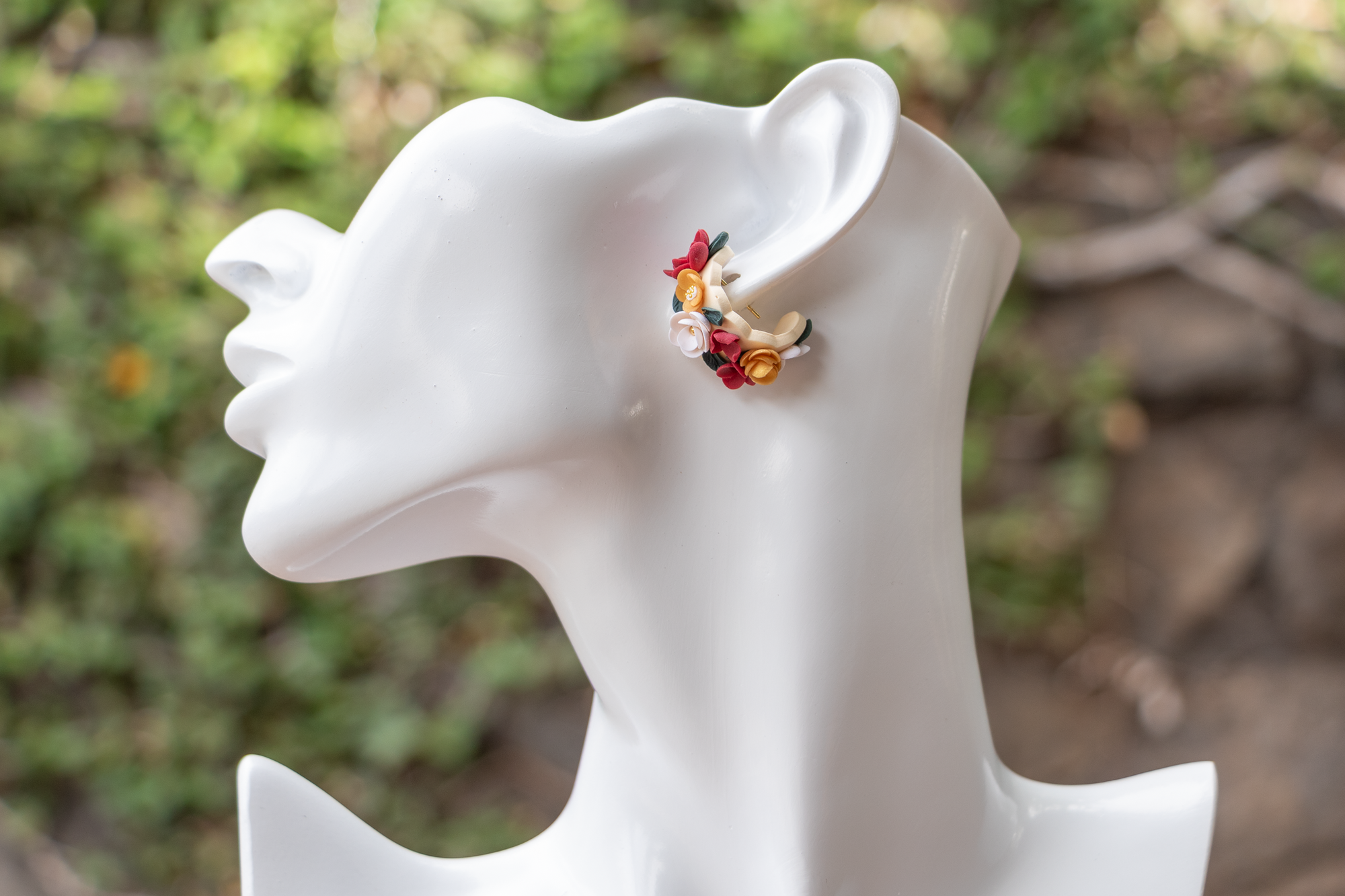 Flower huggie earrings