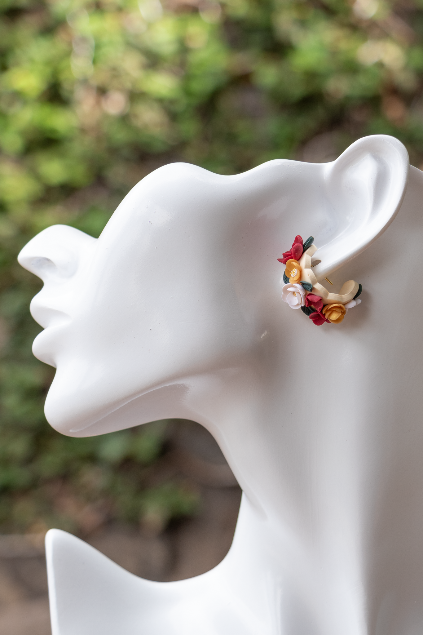 Flower huggie earrings