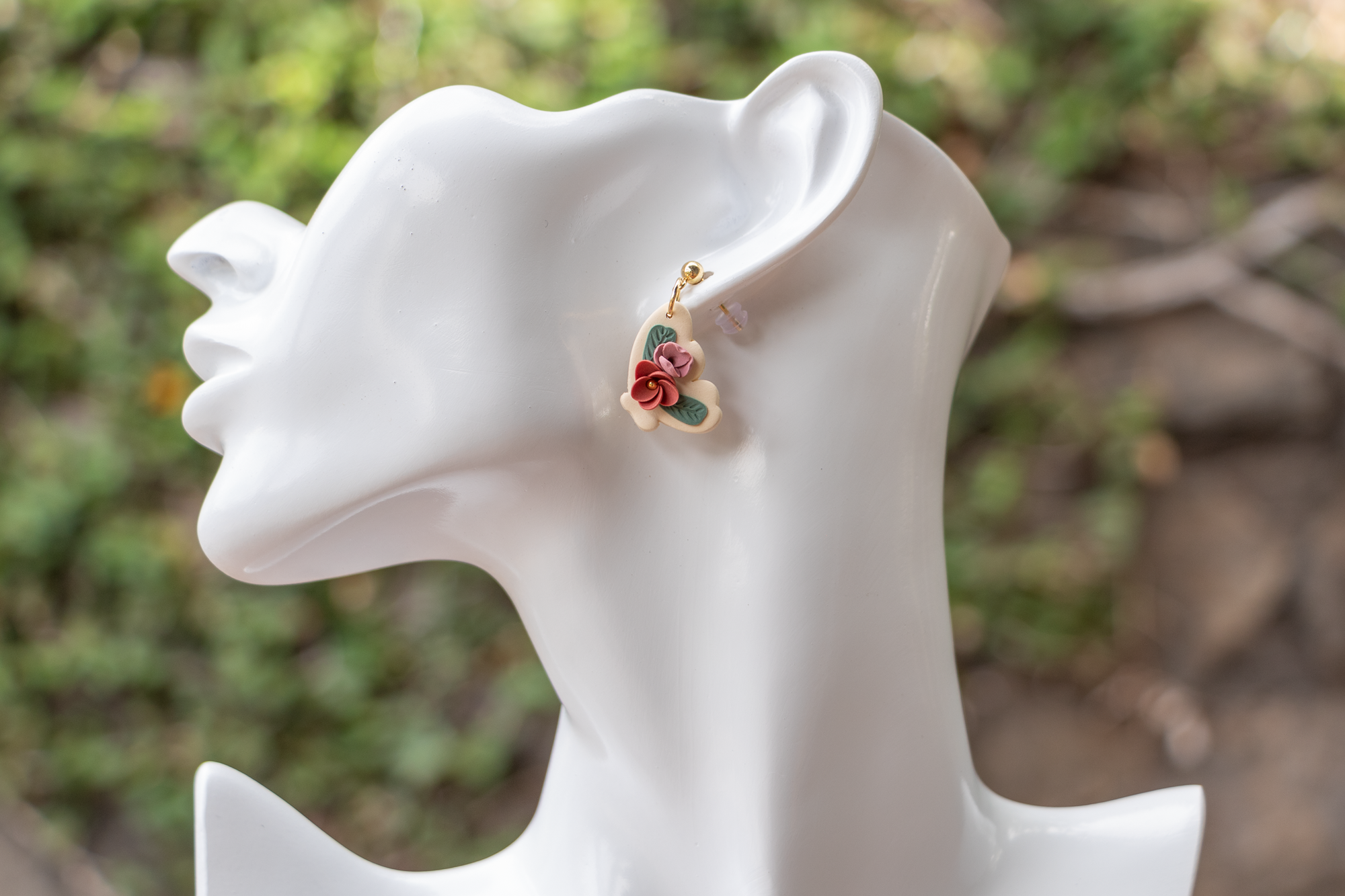 Floral butterfly wing dangle earrings