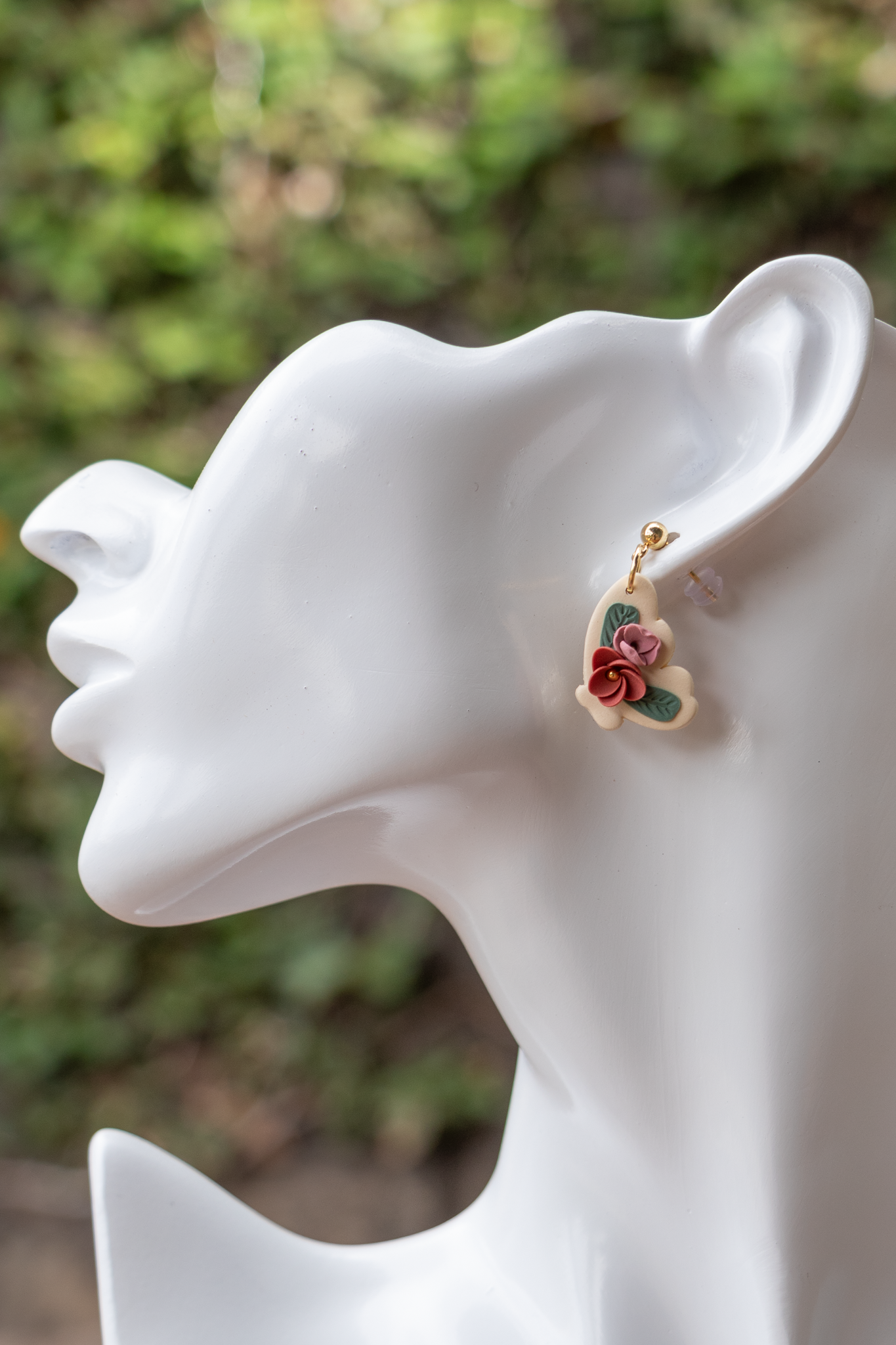 Floral butterfly wing dangle earrings
