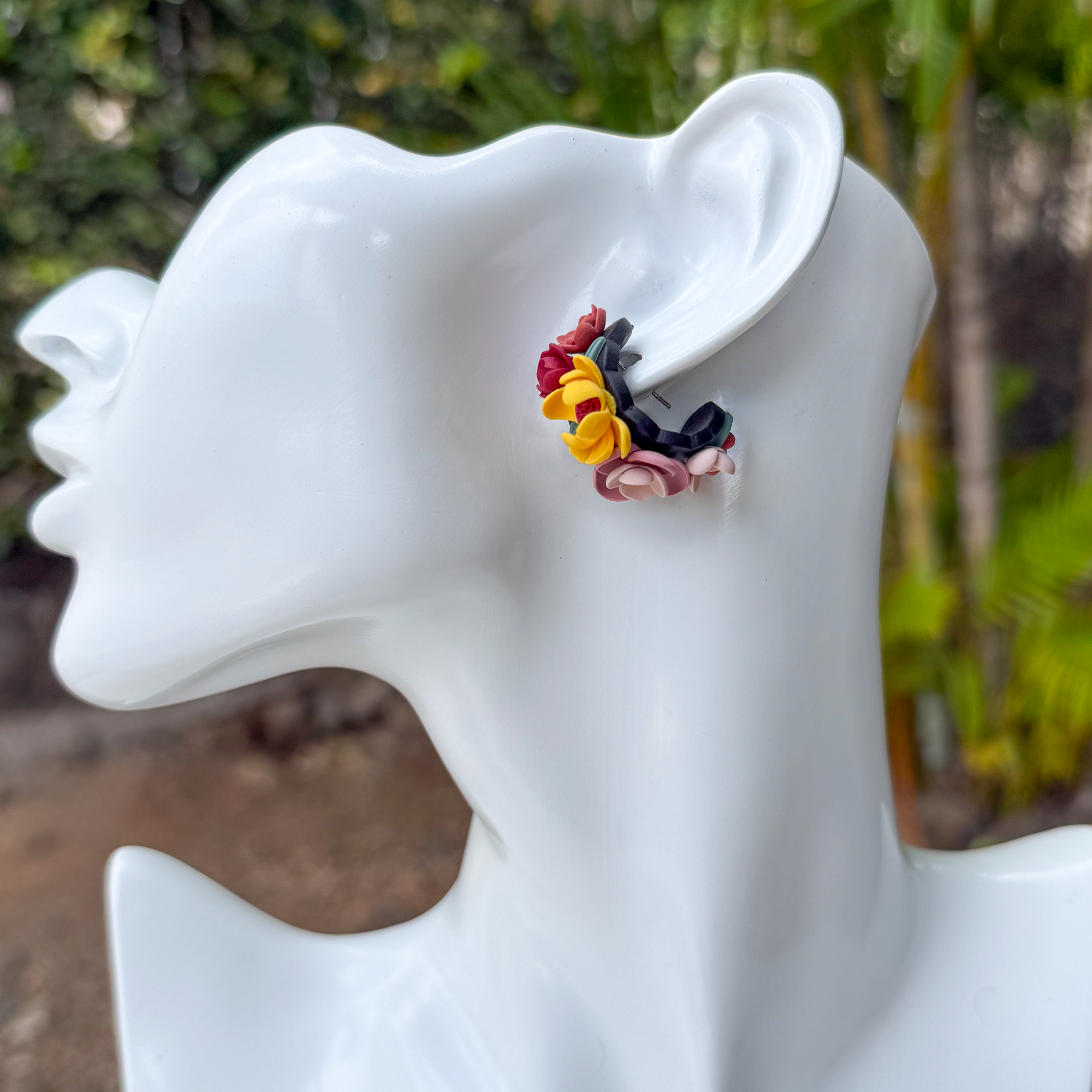 Flower huggie earrings