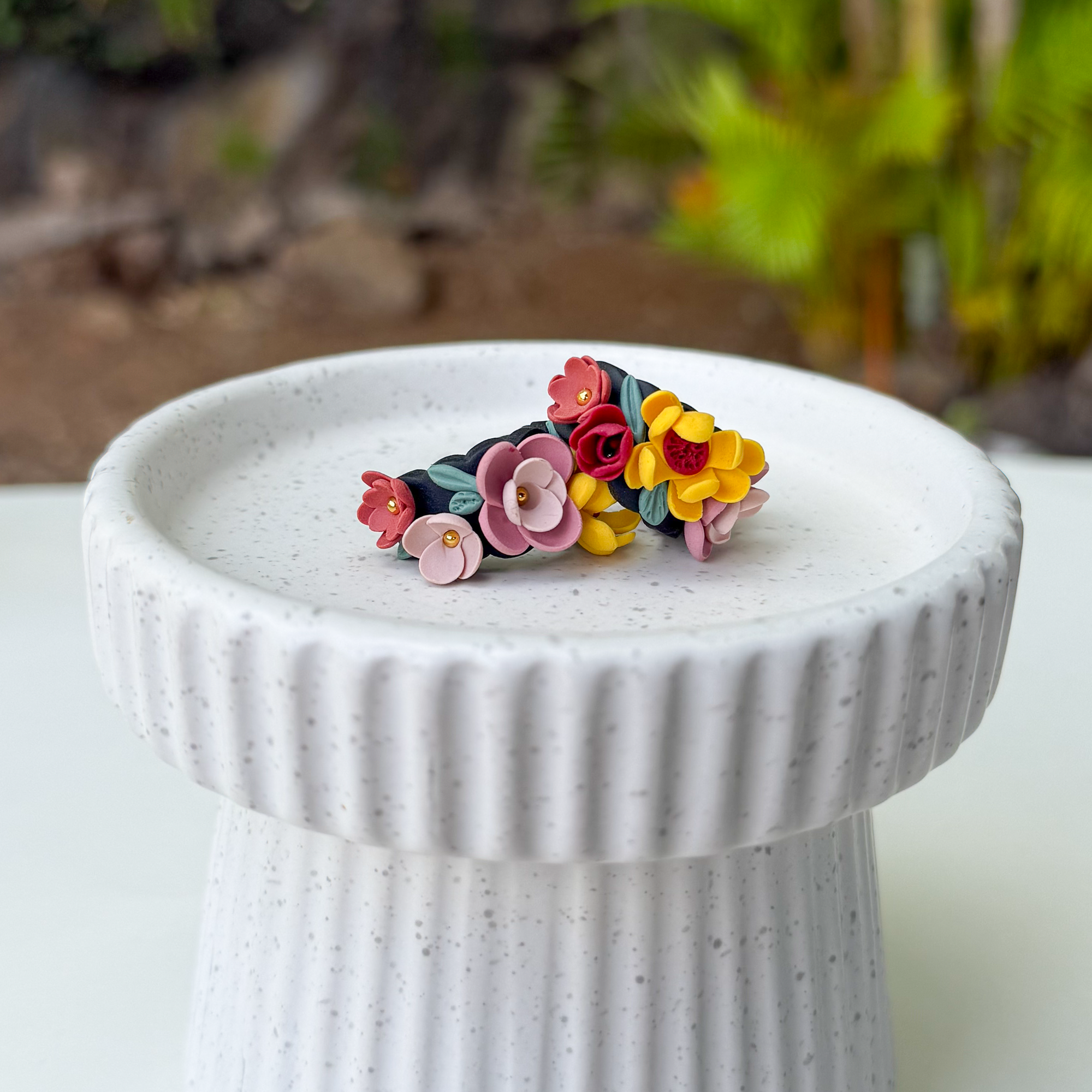 Flower huggie earrings