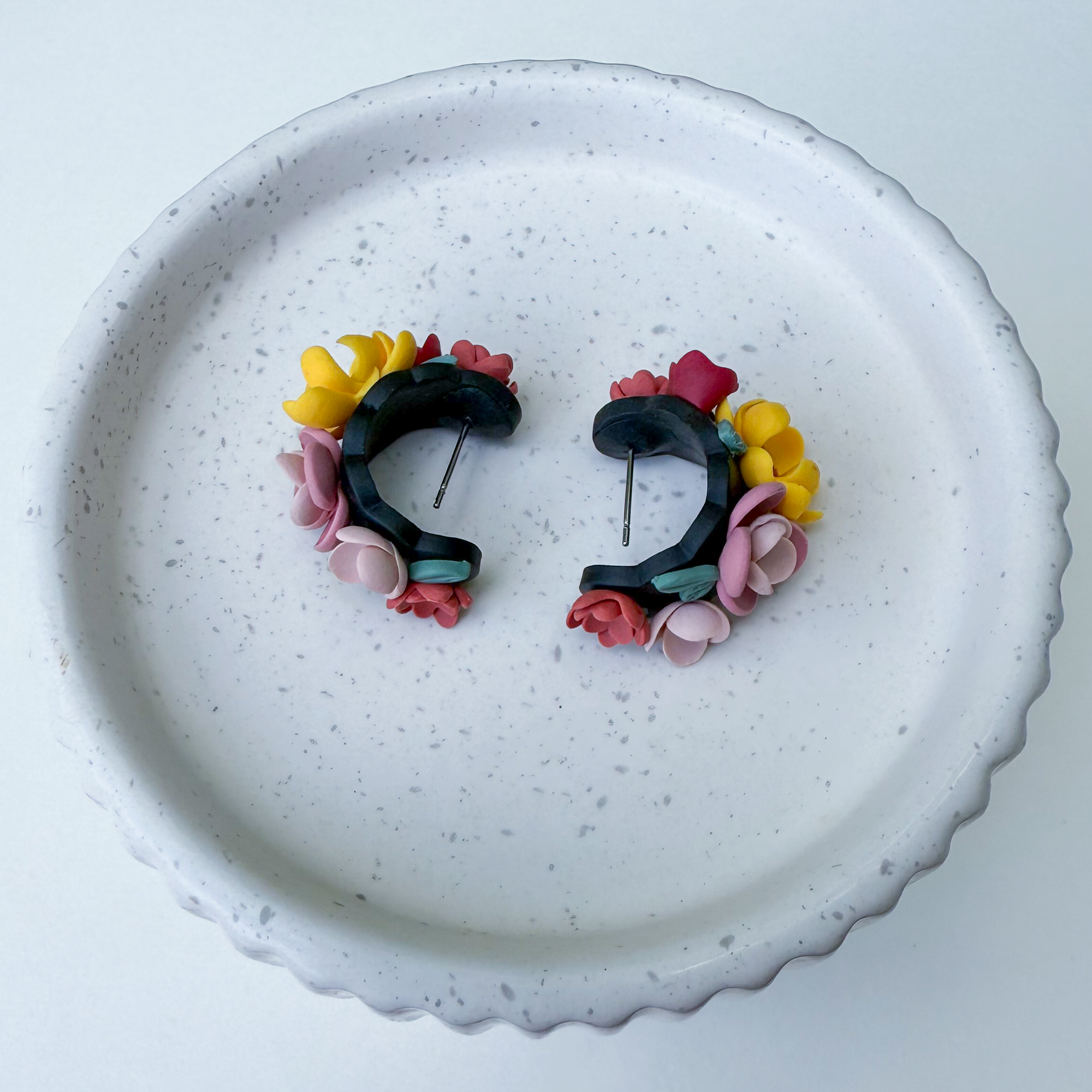 Flower huggie earrings
