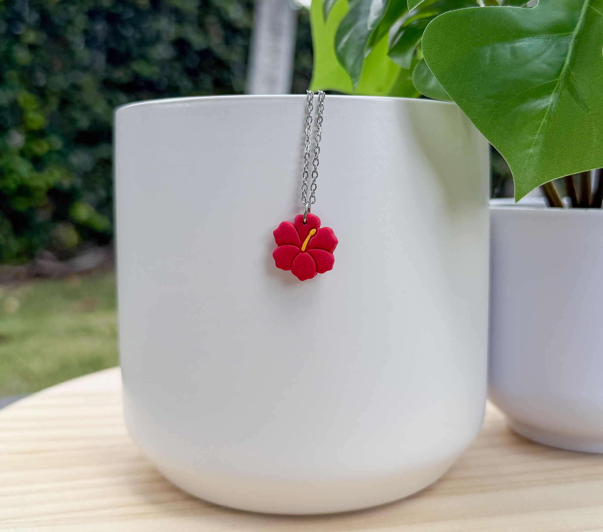 Hibiscus charm necklace