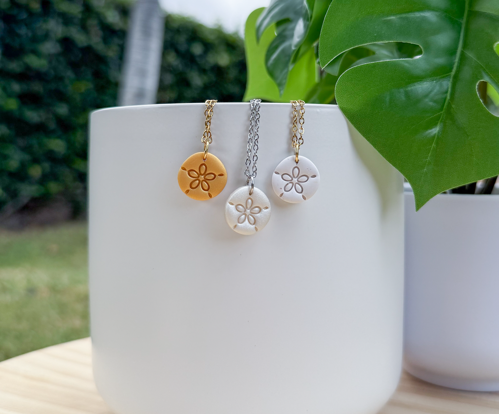 Sand dollar charm necklace