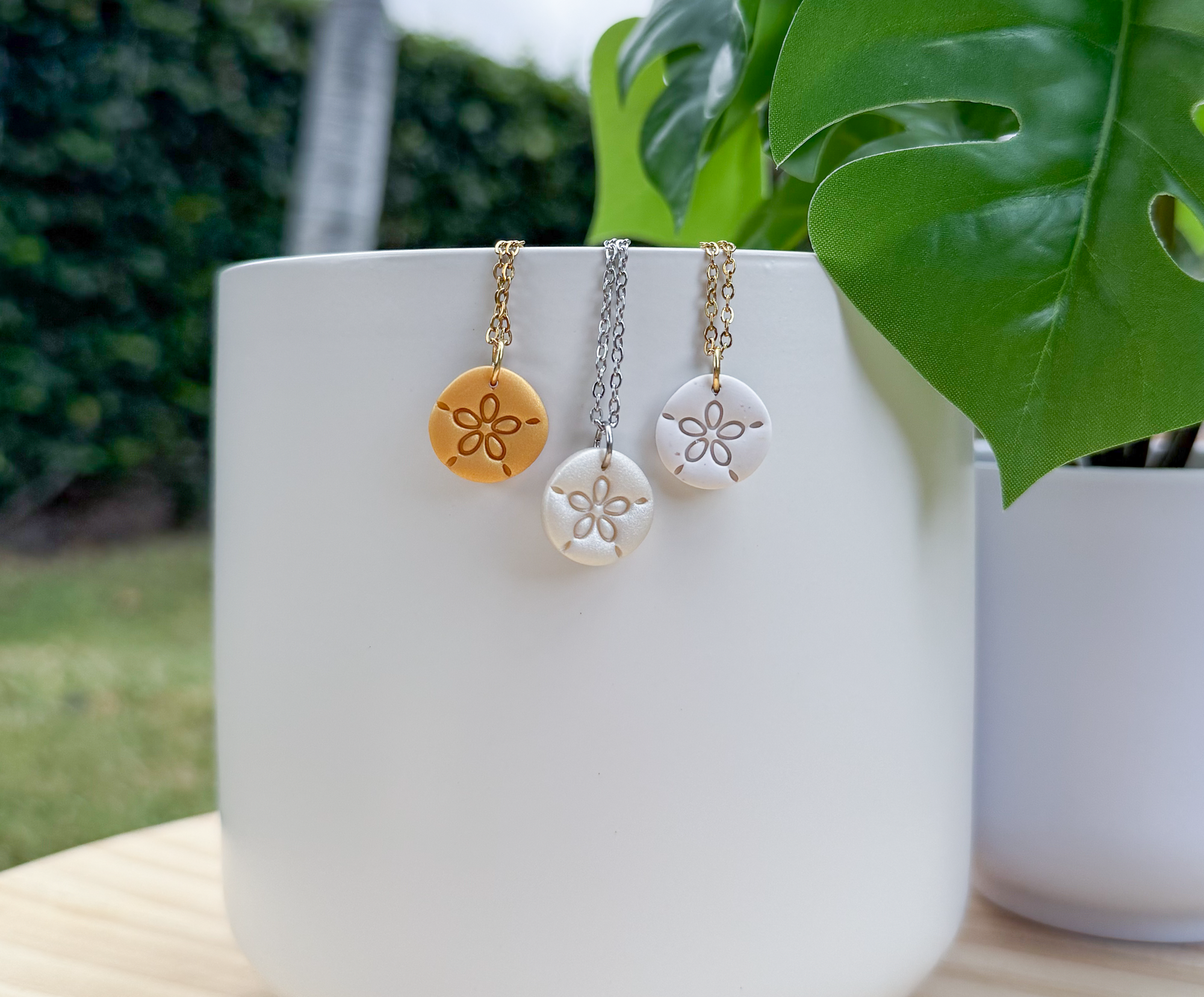 Sand dollar charm necklace