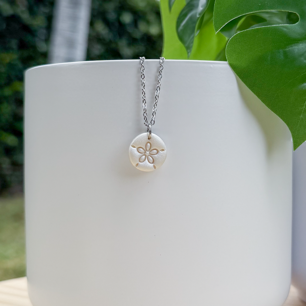 Sand dollar charm necklace
