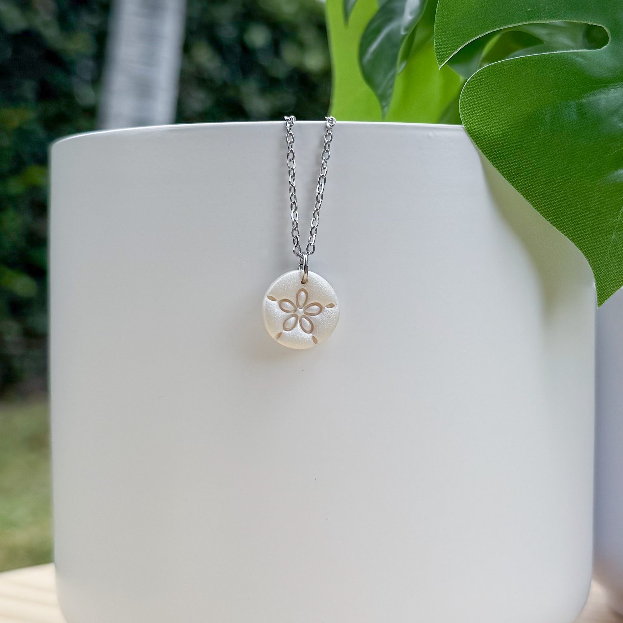 Sand dollar charm necklace